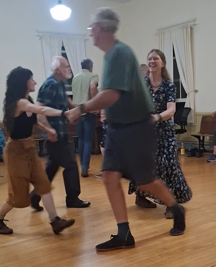happy dancers in a small circle
