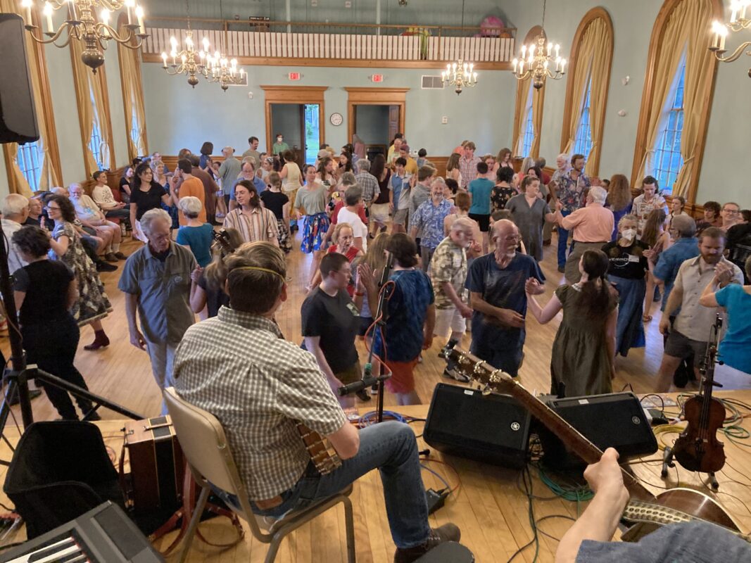 Red Dog Riley playing for a large crowd of dancers